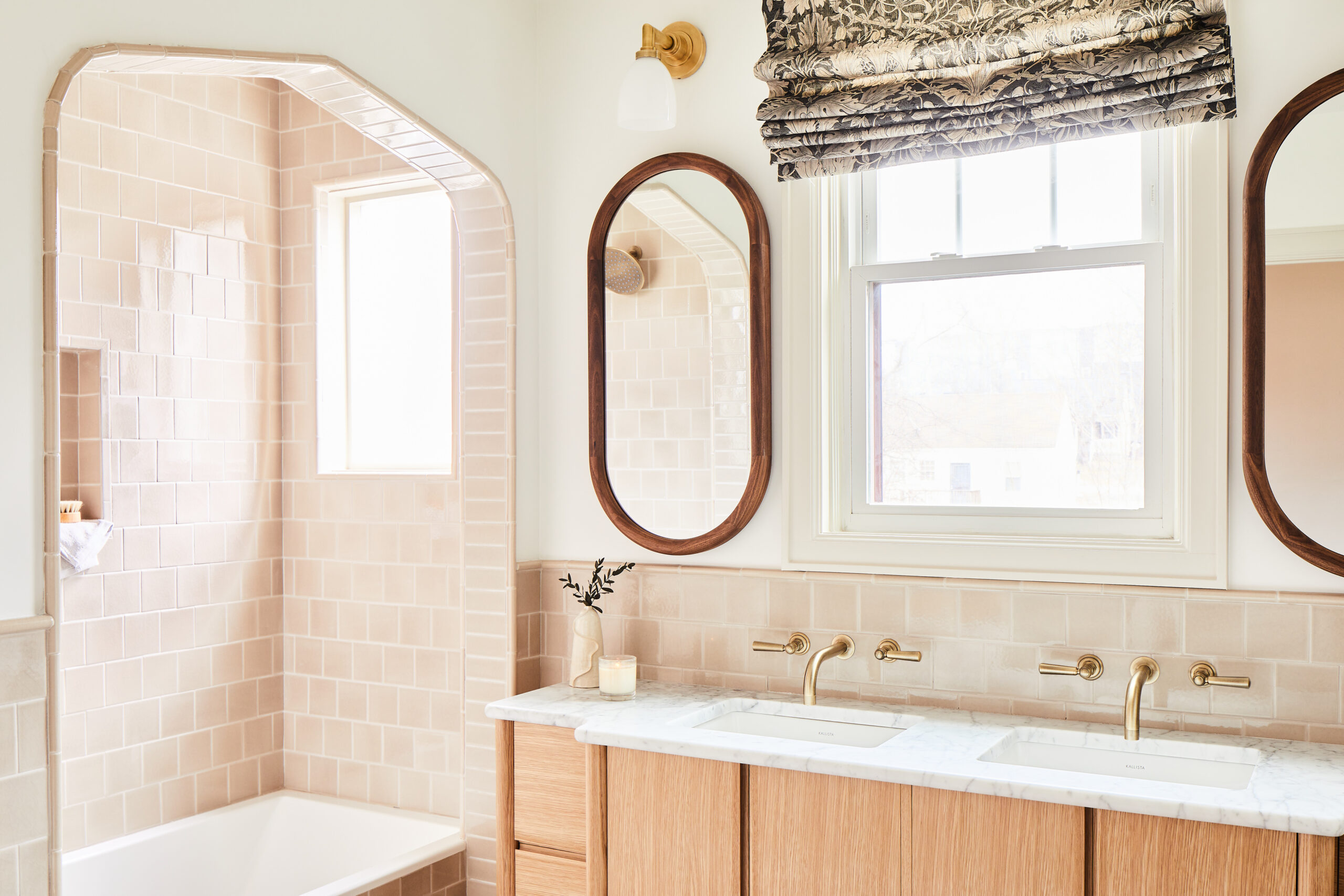 Completed bathroom with tiled walk-in shower and custom vanity